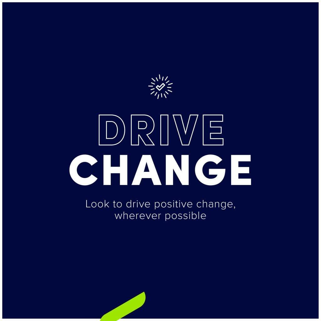 Text on poster read "Drive Change: Look to drive positive change, wherever possible"