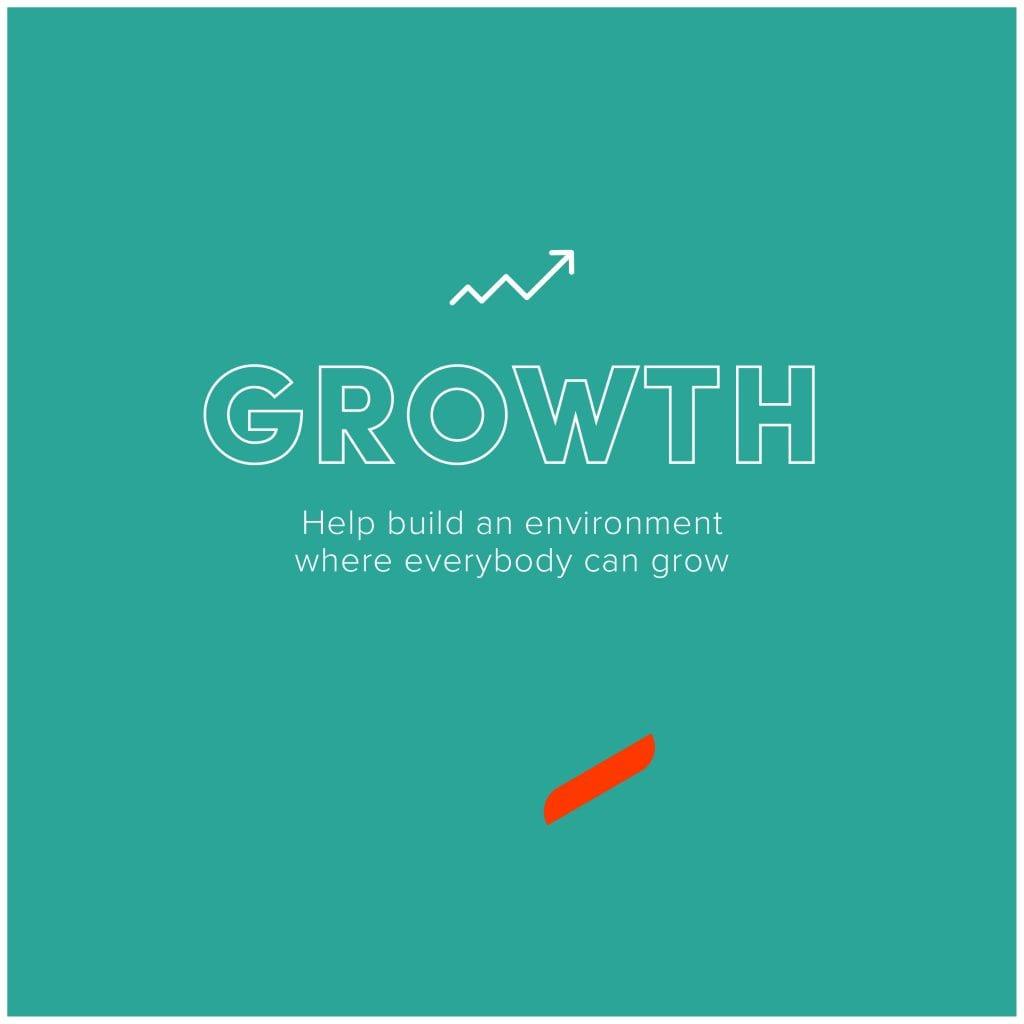 Text on poster read "Growth: Help build an environment where everybody can grow"